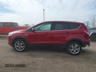 2013 Ford Escape SEL with VIN 1FMCU9H9XDUA81463, listed as a IAAI auction lot 41991257 with 102,867 mi miles and . Bid and sale history available at DreamBid. Image 15.