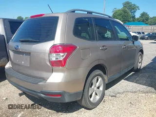 2015 Subaru Forester 2.5i with VIN JF2SJABC2FH557989, listed as a IAAI auction lot 42731804 with 175,663 mi miles and . Bid and sale history available at DreamBid. Image 4.