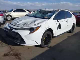2020 Toyota Corolla LE with VIN 5YFEPRAE5LP129961, listed as a IAAI auction lot 41939196 with 60,815 mi miles. Bid and sale history available at carsss.com. Image 2.