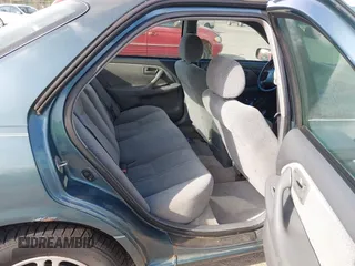 2001 Toyota Camry CE with VIN 4T1BG28K91U852861, listed as a IAAI auction lot 41912480 with 217,404 mi miles. Bid and sale history available at carsss.com. Image 8.