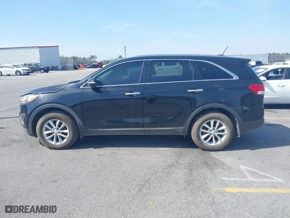 2016 Kia Sorento LX with VIN 5XYPG4A33GG057193, listed as a IAAI auction lot 41788187 with 154,029 mi miles. Bid and sale history available at carsss.com. Image 14.