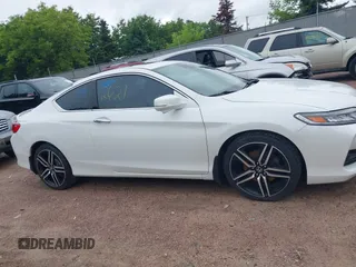 2016 Honda Accord Touring with VIN 1HGCT2B09GA007614, listed as a IAAI auction lot 42532621 with 200,935 mi miles and . Bid and sale history available at DreamBid. Image 13.
