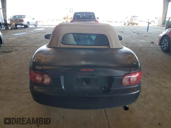 2003 Mazda MX-5 Miata Cloth with VIN JM1NB353730303334, listed as a Copart auction lot 51692615 with 142,789 mi miles and Salvage title. Bid and sale history available at DreamBid. Image 6.