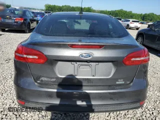 2016 Ford Focus SE with VIN 1FADP3FE8GL381855, listed as a Copart auction lot 57366645 with 104,709 mi miles and Salvage title. Bid and sale history available at DreamBid. Image 6.