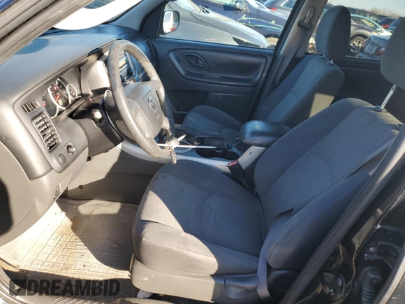 2005 Mazda Tribute i with VIN 4F2YZ02Z75KM57730, listed as a Copart auction lot 82480024 with 188,236 mi miles and Salvage Title. Bid and sale history available at carsss.com. Image 7.