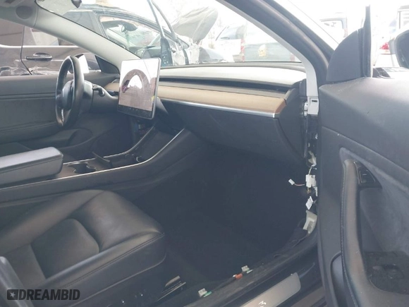 2018 Tesla Model 3 Long Range Battery with VIN 5YJ3E1EA9JF039615, listed as a IAAI auction lot 41756040 with 88,802 mi miles. Bid and sale history available at carsss.com. Image 5.