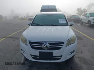 2010 Volkswagen Tiguan SEL with VIN WVGBV7AX6AW521541, listed as a IAAI auction lot 41936952 with 124,499 mi miles and . Bid and sale history available at DreamBid. Image 6.