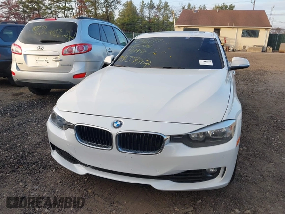 2014 BMW 3 Series 328i xDrive with VIN WBA3B5C52EF958635, listed as a IAAI auction lot 40916777 with 143,975 mi miles. Bid and sale history available at carsss.com. Image 11.