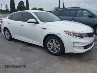 2016 Kia Optima LX with VIN 5XXGT4L32GG047624, listed as a IAAI auction lot 42068219 with 114,316 mi miles. Bid and sale history available at carsss.com. Image 1.