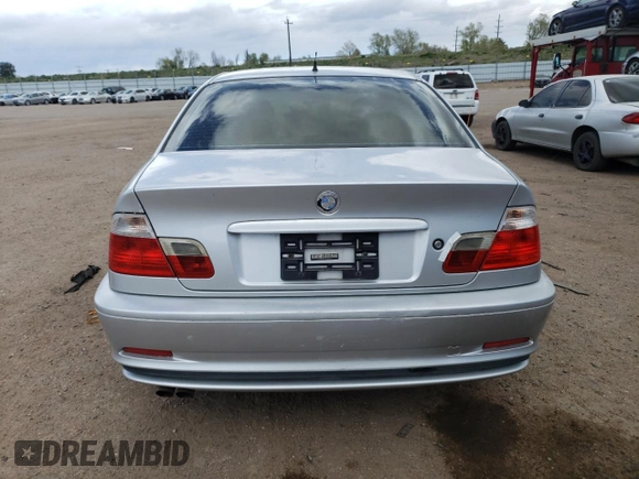 2000 BMW 3 Series 323Ci with VIN WBABM3341YJN62022, listed as a Copart auction lot 53943414 with 208,047 mi miles and Salvage Title. Bid and sale history available at DreamBid. Image 6.