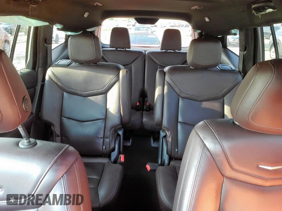 2021 Cadillac XT6 Premium Luxury z VIN 1GYKPCRS3MZ195999, wystawiony jako Copart lot #53261595 z przebiegiem 81 843 mil mil oraz Szkoda całkowita • Salvage title. Historia ofert i sprzedaży dostępna na DreamBid. Obrazek 10.