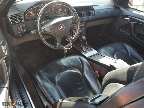 2000 Mercedes-Benz SL-Class with VIN WDBFA68FXYF193901, listed as a Copart auction lot 79173514 with 143,019 mi miles and Salvage Title. Bid and sale history available at carsss.com. Image 8.