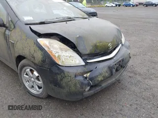 2008 Toyota Prius z VIN JTDKB20U187780823, wystawiony jako IAAI lot #42288104 z przebiegiem Nie podano mil oraz . Historia ofert i sprzedaży dostępna na DreamBid. Obrazek 12.