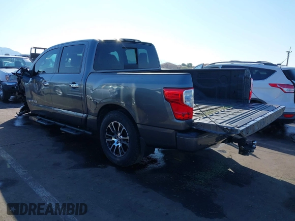 2021 Nissan Titan SV with VIN 1N6AA1EF2MN504611, listed as a IAAI auction lot 41469990 with 81,432 mi miles and . Bid and sale history available at DreamBid. Image 3.
