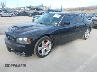 2006 Dodge Charger SRT-8 with VIN 2B3LA73W96H371246, listed as a IAAI auction lot 41676168 with 130,064 mi miles and . Bid and sale history available at carsss.com. Image 20.