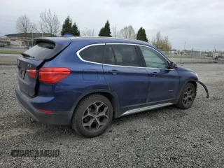 2016 BMW X1 xDrive28i with VIN WBXHT3C33G5E49242, listed as a Copart auction lot 51947625 with 105,538 mi miles and Salvage Title. Bid and sale history available at carsss.com. Image 3.