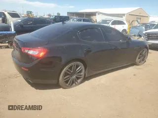 2016 Maserati Ghibli S z VIN ZAM57RSA6G1173551, wystawiony jako Copart lot #61822555 z przebiegiem 90 063 mil mil oraz Czysty tytuł • Clean title. Historia ofert i sprzedaży dostępna na DreamBid. Obrazek 3.