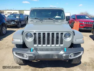2023 Jeep Wrangler 4xe Sahara with VIN 1C4JJXP62PW696002, listed as a IAAI auction lot 41891127 with 44,567 mi miles. Bid and sale history available at carsss.com. Image 12.