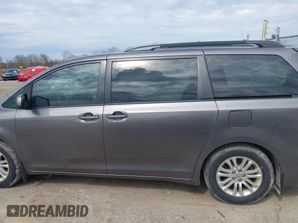 2014 Toyota Sienna XLE with VIN 5TDYK3DC4ES463315, listed as a IAAI auction lot 42108050 with 197,140 mi miles. Bid and sale history available at carsss.com. Image 14.