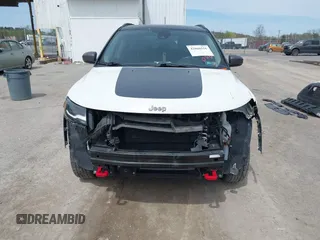 2017 Jeep Compass Trailhawk with VIN 3C4NJDDBXHT500588, listed as a IAAI auction lot 42060556 with 76,788 mi miles and . Bid and sale history available at DreamBid. Image 13.