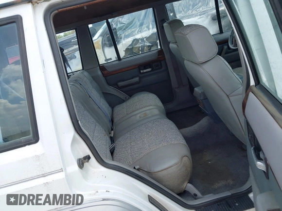 1993 Jeep Cherokee Country with VIN 1J4FJ78S2PL578769, listed as a IAAI auction lot 42732237 with 102,314 mi miles and . Bid and sale history available at DreamBid. Image 8.