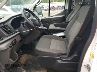 2020 Ford Transit Cargo with VIN 1FTYE1Y87LKA06133, listed as a Copart auction lot 70294424 with 81,602 mi miles and Salvage Title. Bid and sale history available at DreamBid. Image 7.