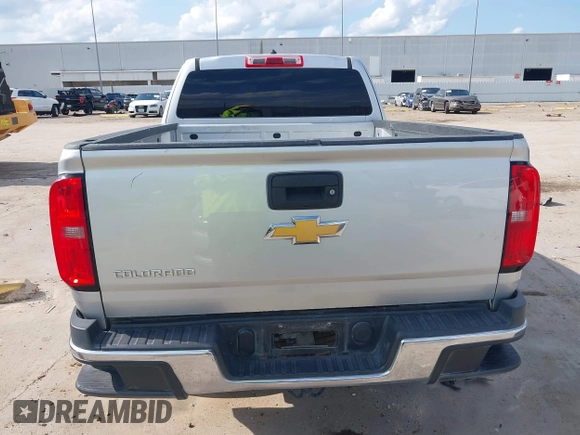 2018 Chevrolet Colorado 2WD Work Truck with VIN 1GCHSBEA2J1297195, listed as a IAAI auction lot 42384977 with 127,015 mi miles and . Bid and sale history available at DreamBid. Image 16.