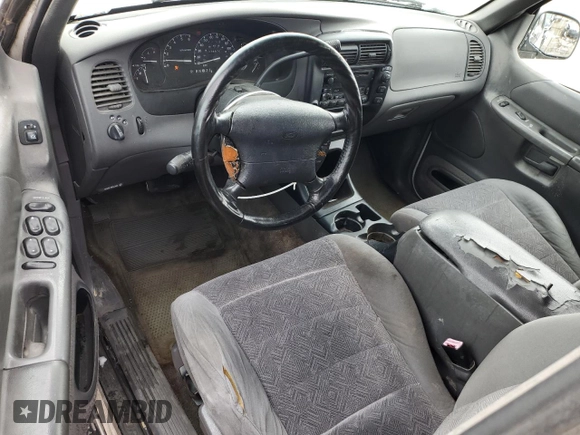 1999 Ford Explorer XLT with VIN 1FMZU32E7XUC76809, listed as a Copart auction lot 45503065 with 276,876 mi miles and Salvage title. Bid and sale history available at DreamBid. Image 8.