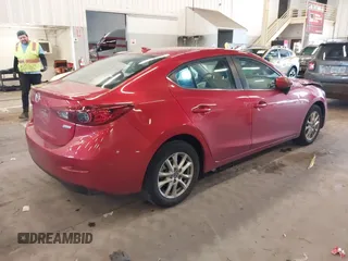 2014 Mazda 3 i Grand Touring with VIN JM1BM1W70E1202281, listed as a IAAI auction lot 41946081 with 55,536 mi miles and . Bid and sale history available at DreamBid. Image 4.