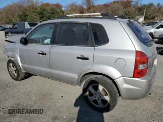 2005 Hyundai Tucson GL with VIN KM8JM12B95U067091, listed as a Copart auction lot 79297524 with 0 mi miles and Salvage Title. Bid and sale history available at carsss.com. Image 2.