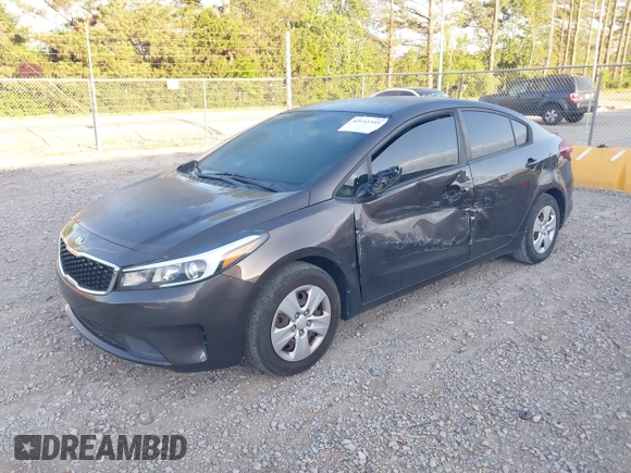 2018 Kia Forte LX with VIN 3KPFL4A70JE182702, listed as a IAAI auction lot 42043345 with 105,451 mi miles and . Bid and sale history available at DreamBid. Image 2.