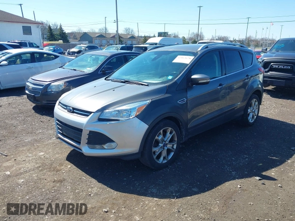 2014 Ford Escape Titanium with VIN 1FMCU9JX1EUB94776, listed as a IAAI auction lot 42063678 with 138,036 mi miles. Bid and sale history available at carsss.com. Image 17.