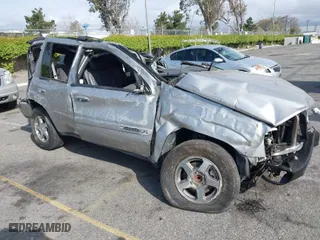 2004 Chevrolet TrailBlazer LT with VIN 1GNDS13S442417203, listed as a IAAI auction lot 41858690 with 98,983 mi miles. Bid and sale history available at carsss.com. Image 1.
