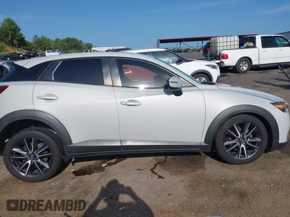 2018 Mazda CX-3 Touring with VIN JM1DKDC73J0319938, listed as a IAAI auction lot 39861564 with 117,199 mi miles. Bid and sale history available at carsss.com. Image 13.