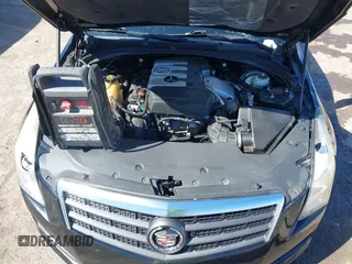 2014 Cadillac ATS Standard RWD with VIN 1G6AA5RX3E0101977, listed as a IAAI auction lot 40459124 with 125,360 mi miles. Bid and sale history available at carsss.com. Image 10.