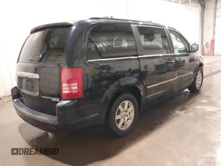 2010 Chrysler Town & Country Touring z VIN 2A4RR5D1XAR148753, wystawiony jako IAAI lot #41830153 z przebiegiem 158 867 mil mil oraz . Historia ofert i sprzedaży dostępna na DreamBid. Obrazek 4.