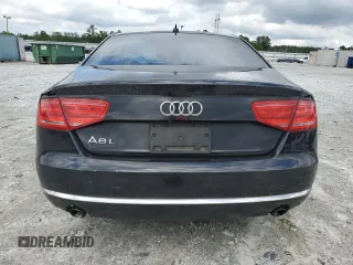 2014 Audi A8 3.0T z VIN WAURGAFD5EN007035, wystawiony jako Copart lot #58578545 z przebiegiem 199 696 mil mil oraz Tytuł czysty. Historia ofert i sprzedaży dostępna na DreamBid. Obrazek 6.