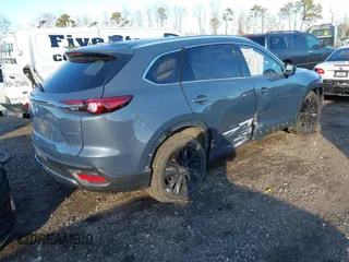 2023 Mazda CX-9 Grand Touring with VIN JM3TCBDY4P0647891, listed as a IAAI auction lot 41248595 with 18,647 mi miles and . Bid and sale history available at carsss.com. Image 4.