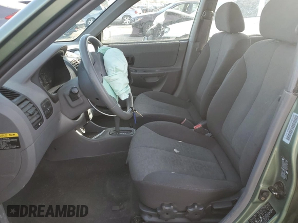 2004 Hyundai Accent GL with VIN KMHCG45C44U531828, listed as a Copart auction lot 86428134 with 92,054 mi miles and Salvage Title. Bid and sale history available at carsss.com. Image 7.
