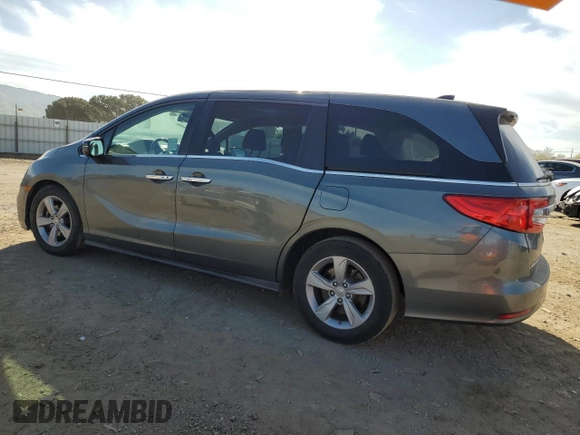 2018 Honda Odyssey EX-L with VIN 5FNRL6H76JB010103, listed as a Copart auction lot 52965965 with 129,837 mi miles and Salvage Title. Bid and sale history available at carsss.com. Image 2.