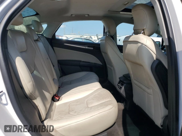 2014 Ford Fusion Titanium с VIN 3FA6P0K91ER373269, выставлен на аукционе Copart как лот 55870365 с пробегом 171 165 миль миль и Списание • Salvage title. История ставок и продаж доступна на DreamBid. Изображение 10.