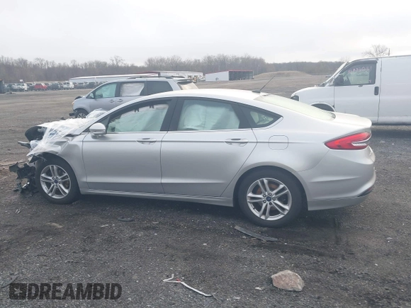 2018 Ford Fusion SE z VIN 3FA6P0HD2JR207865, wystawiony jako IAAI lot #41835895 z przebiegiem 91 069 mil mil oraz . Historia ofert i sprzedaży dostępna na DreamBid. Obrazek 14.