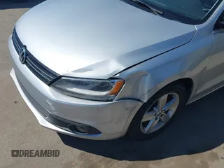 2012 Volkswagen Jetta TDI w/Premium with VIN 3VWLL7AJ8CM314305, listed as a IAAI auction lot 41885355 with 75,669 mi miles and . Bid and sale history available at DreamBid. Image 11.