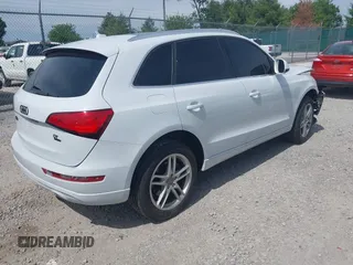 2014 Audi Q5 Premium Plus z VIN WA1CMAFP9EA041976, wystawiony jako IAAI lot #42296067 z przebiegiem 131 906 mil mil oraz . Historia ofert i sprzedaży dostępna na DreamBid. Obrazek 4.