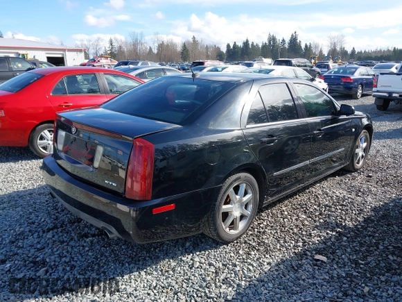 2005 Cadillac STS with VIN 1G6DW677250190268, listed as a IAAI auction lot 41702798 with 142,427 mi miles. Bid and sale history available at carsss.com. Image 4.
