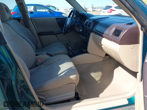 2001 Subaru Forester L with VIN JF1SF63561G719978, listed as a IAAI auction lot 41993814 with 208,781 mi miles. Bid and sale history available at carsss.com. Image 5.