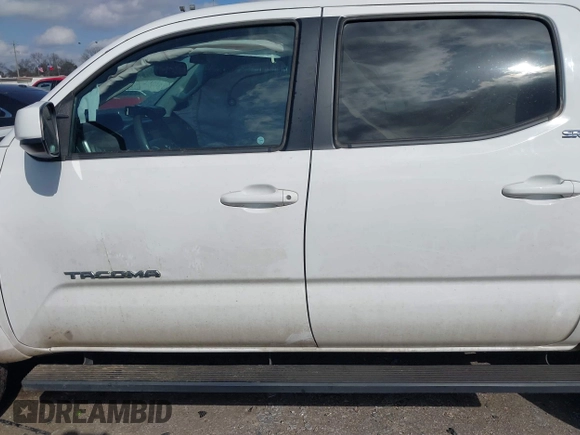 2017 Toyota Tacoma SR5 with VIN 5TFAZ5CN8HX043633, listed as a IAAI auction lot 41520703 with 104,711 mi miles and . Bid and sale history available at DreamBid. Image 14.