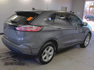 2022 Ford Edge SE z VIN 2FMPK4G97NBA56541, wystawiony jako IAAI lot #42175569 z przebiegiem 57 756 mil mil oraz . Historia ofert i sprzedaży dostępna na DreamBid. Obrazek 1.