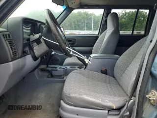 1998 Jeep Cherokee Sport with VIN 1J4FJ68S6WL215447, listed as a Copart auction lot 65186505 with 177,682 mi miles and Clean title. Bid and sale history available at DreamBid. Image 7.