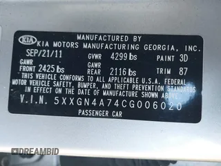 2012 Kia Optima EX with VIN 5XXGN4A74CG006020, listed as a IAAI auction lot 41792019 with 77,582 mi miles. Bid and sale history available at carsss.com. Image 9.